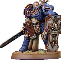 Futuristic warrior in full armour in 1/64 scale - Primaris Space Marine Lieutenant in Mk10 Tacticus armour, with power sword and storm shield for Warhammer 40,000 Ed9 from Games Workshop, 2021 - Miniature figure review