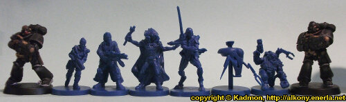 Size comparison of the mercenaries from Star Saga: The Eiras Contract Core Set from with 1:64 (28mm/32mm) scale scale Primaris Space Marines from Games Workshop. From left to right: Primaris Space Marine Hellblaster Sergeant #1, Captain Erika Dulinsky, Francesco 'The Devil' Silvaggio, Alyse, Wrath #2, Combat Utility Robot B07153 'Curby', Ogan Helkkare, Primaris Space Marine Hellblaster #2.