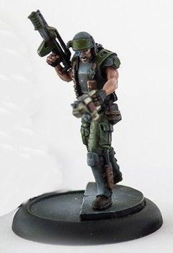 Futuristic soldier in modern armour with assault rifle and scanner (USCM Marine #2 for Alien vs Predator: The Hunt Begins) from Prodos Games - Miniature figure